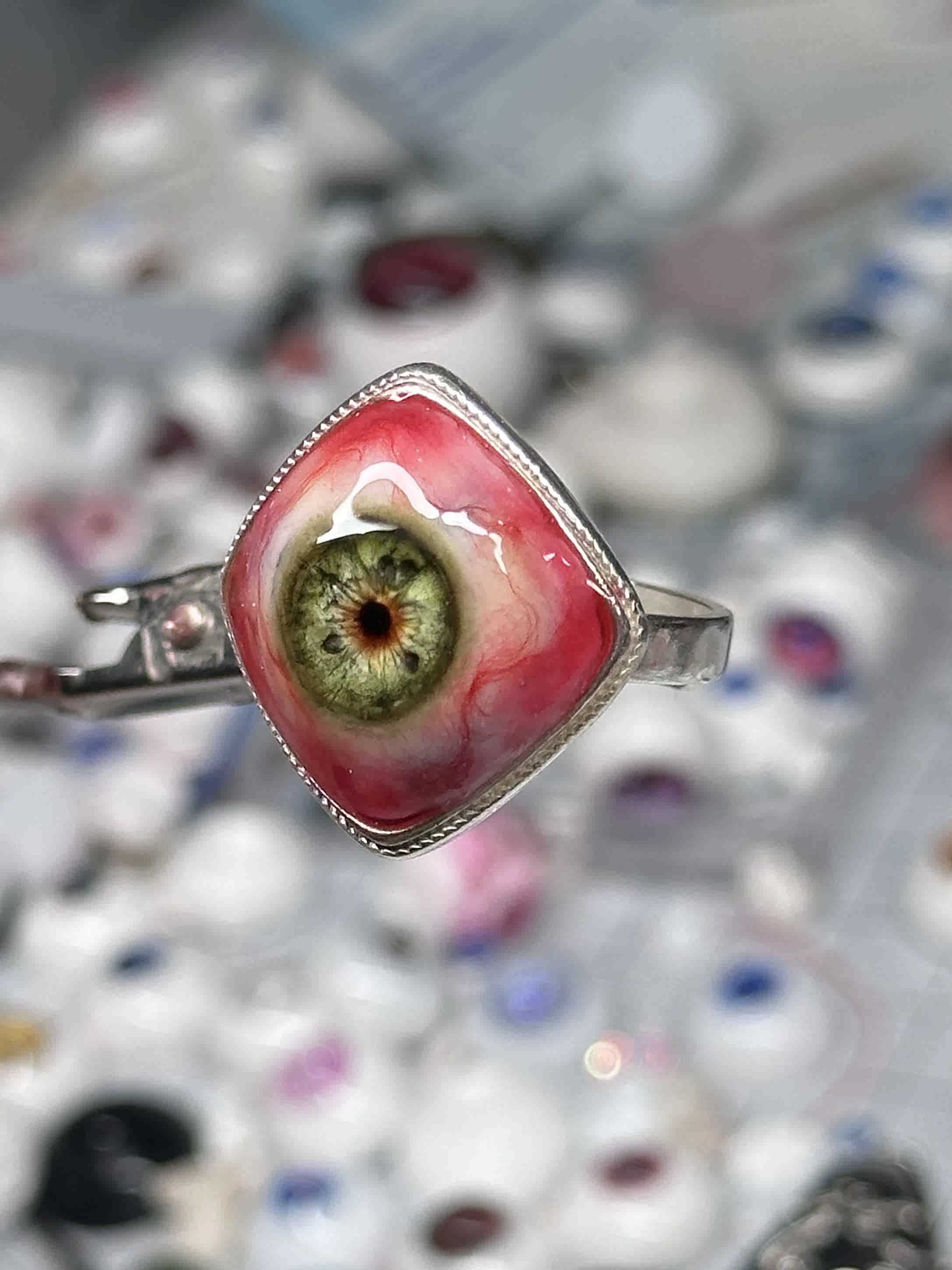 spooky cute pastel goth ring with red resin charm