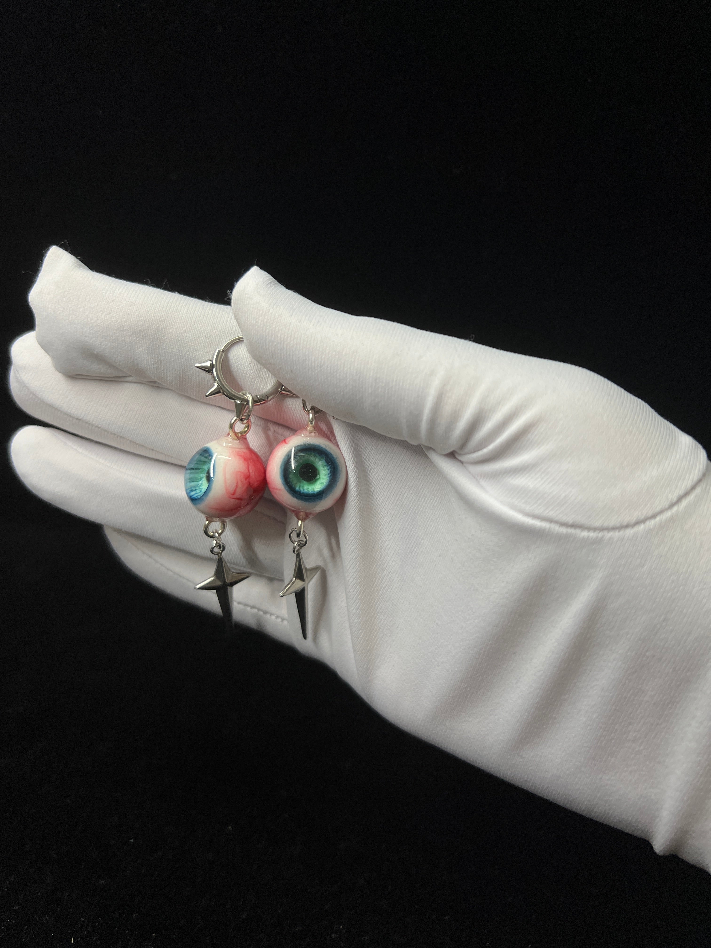 handmade green resin eyeball earrings creepy cute gothic style by NocturneCraft