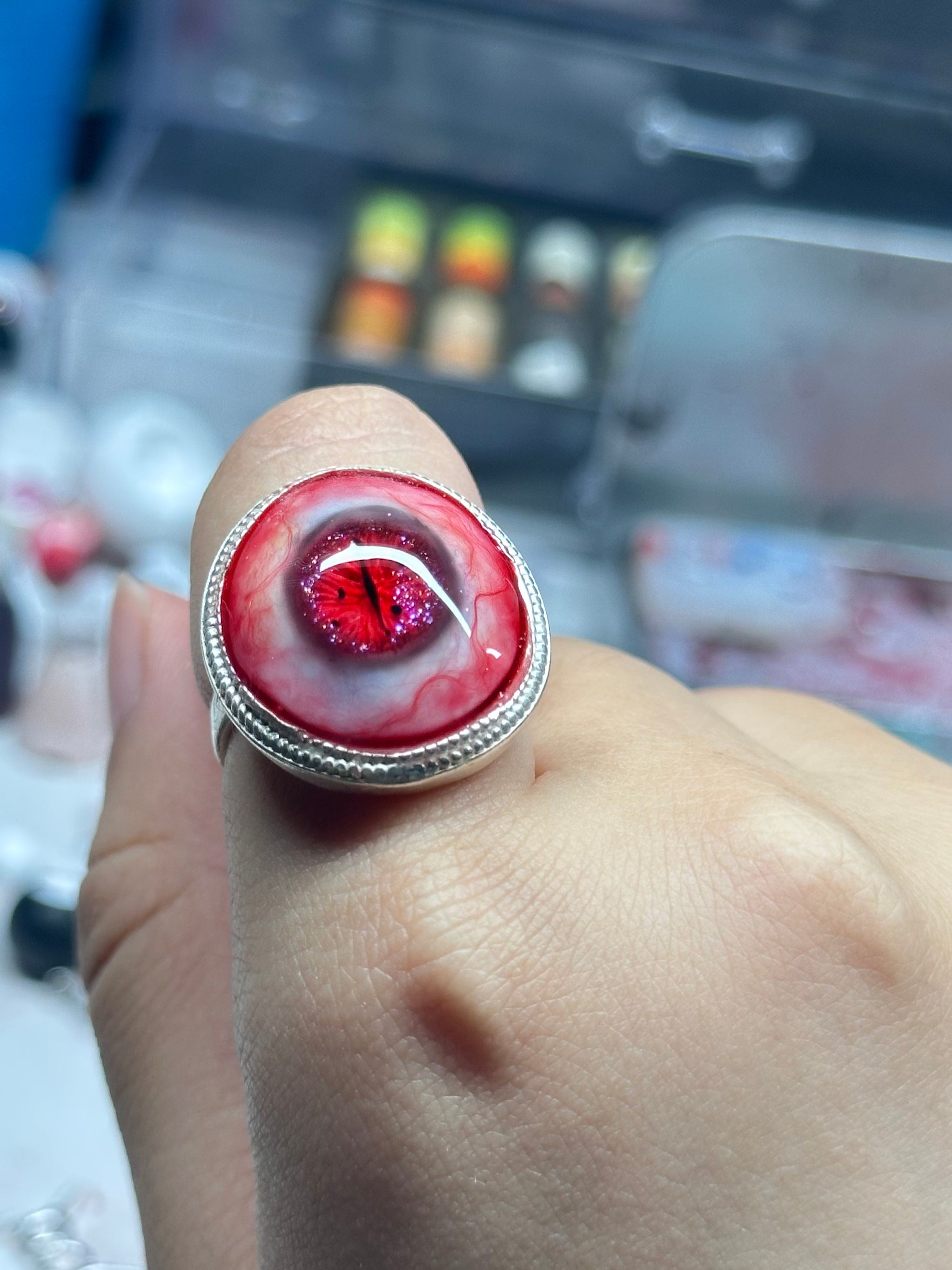 spooky cute pastel goth ring with red resin charm