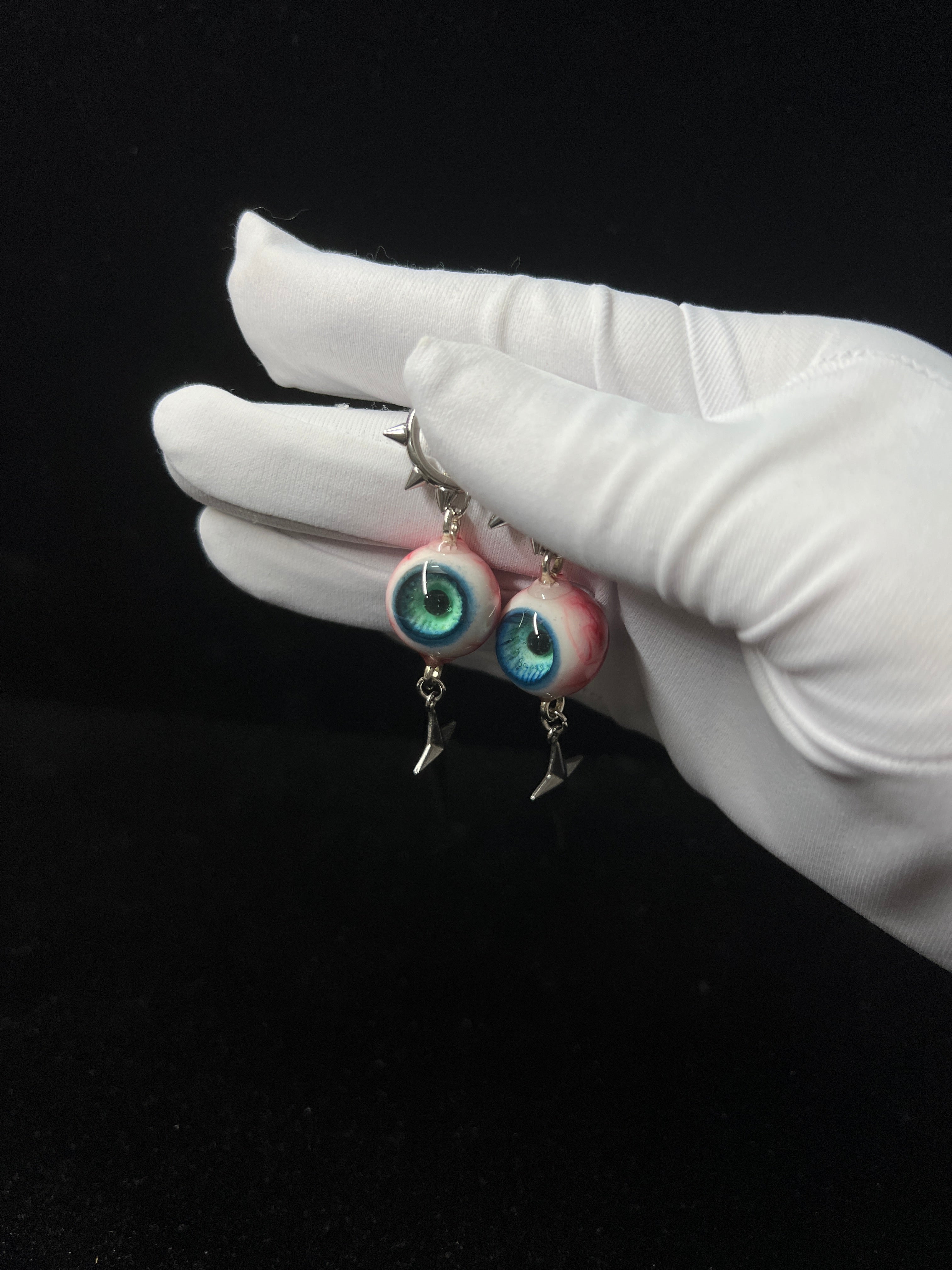 handmade green resin eyeball earrings creepy cute gothic style by NocturneCraft