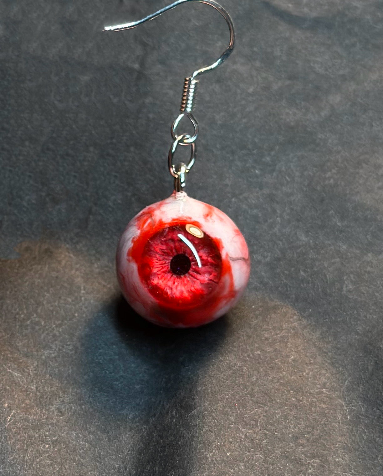 NocturneCraft spooky cute earrings resin eyeball design pastel goth fashion