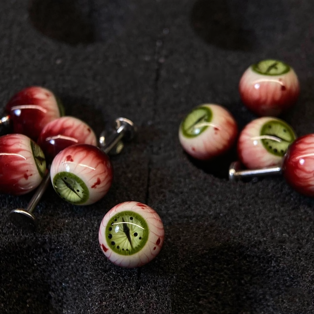 goth cute eyeball studs close up