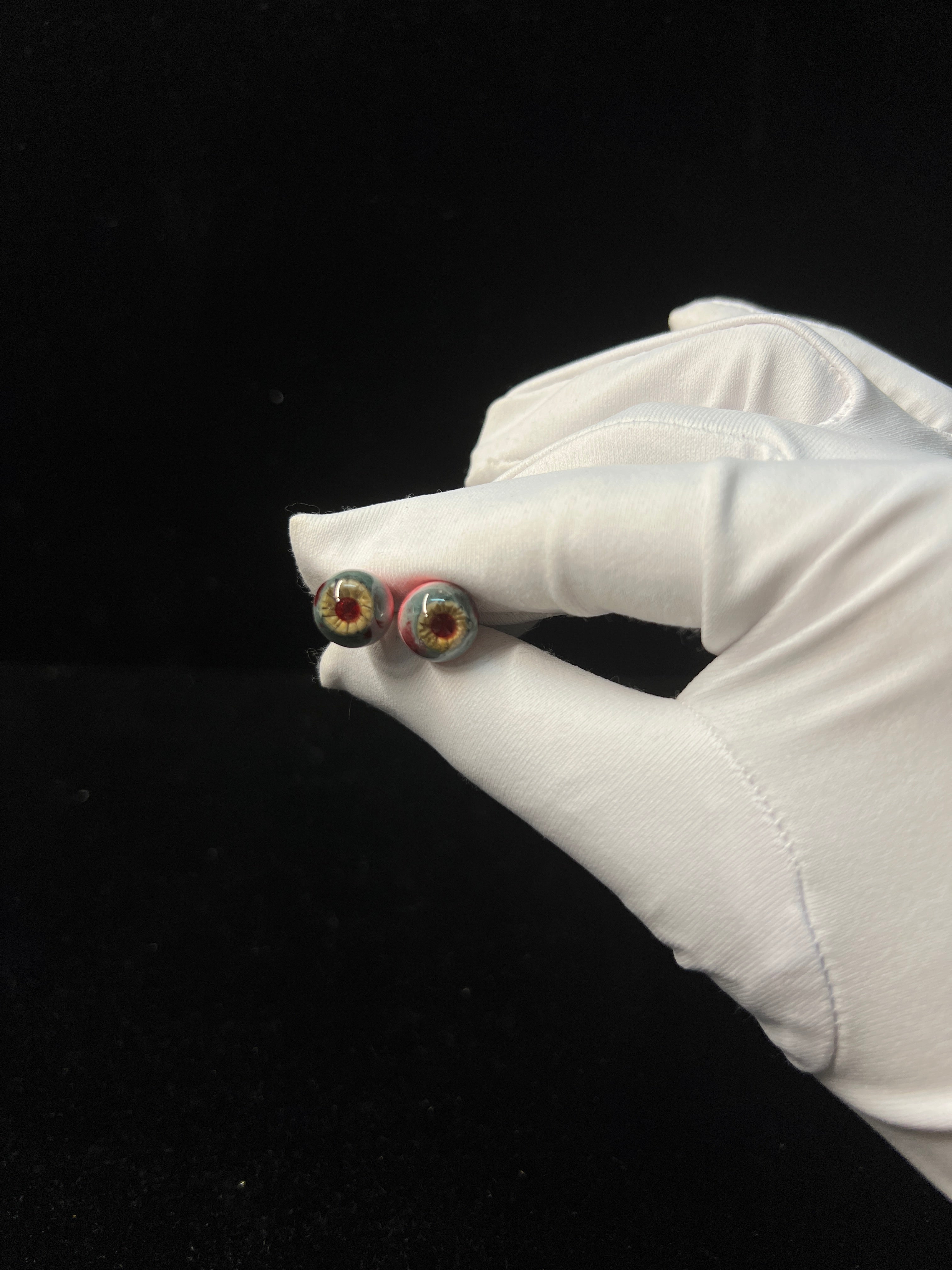 handmade yellow resin eyeball earrings creepy cute gothic style by NocturneCraft