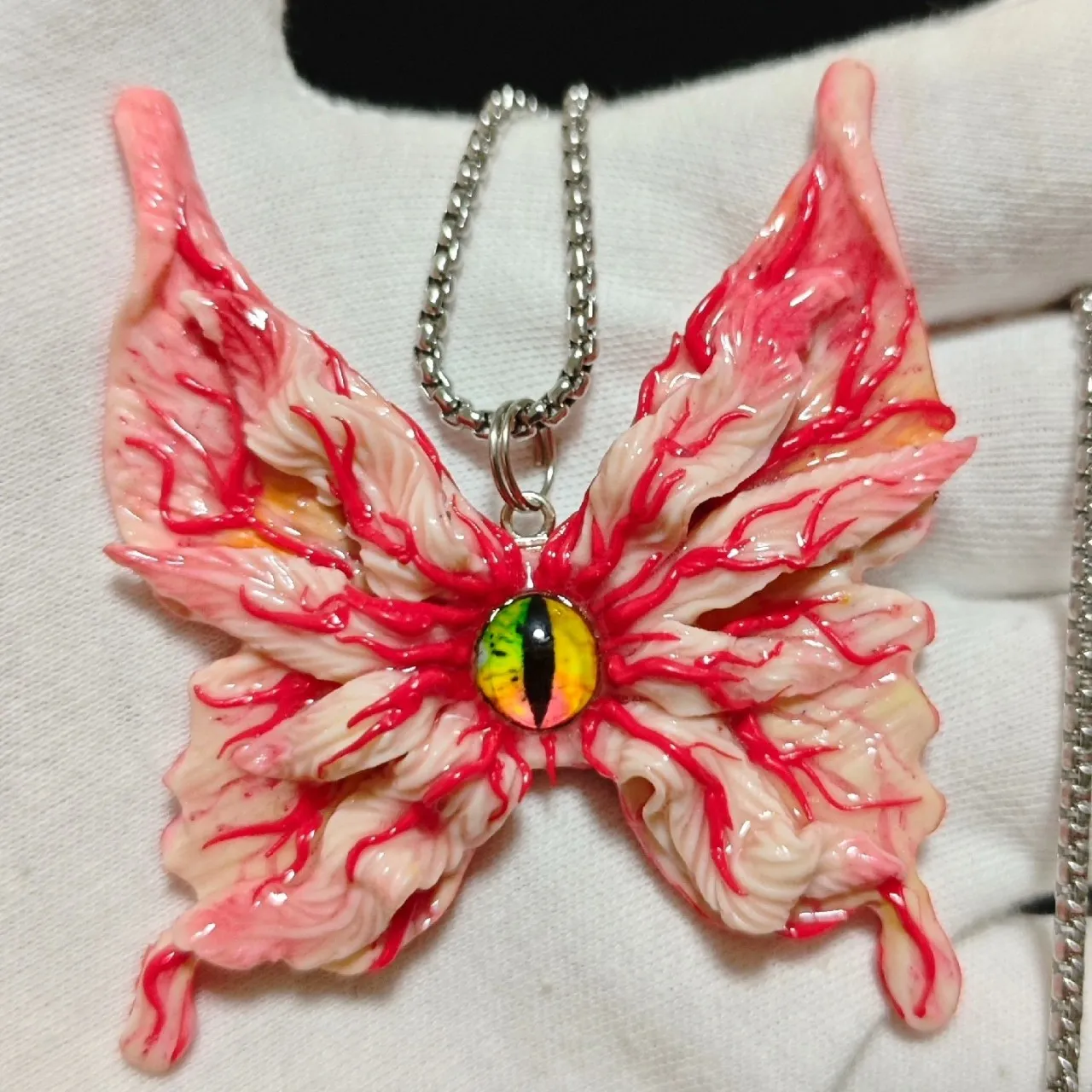 Butterfly Eye Tentacle Pendant